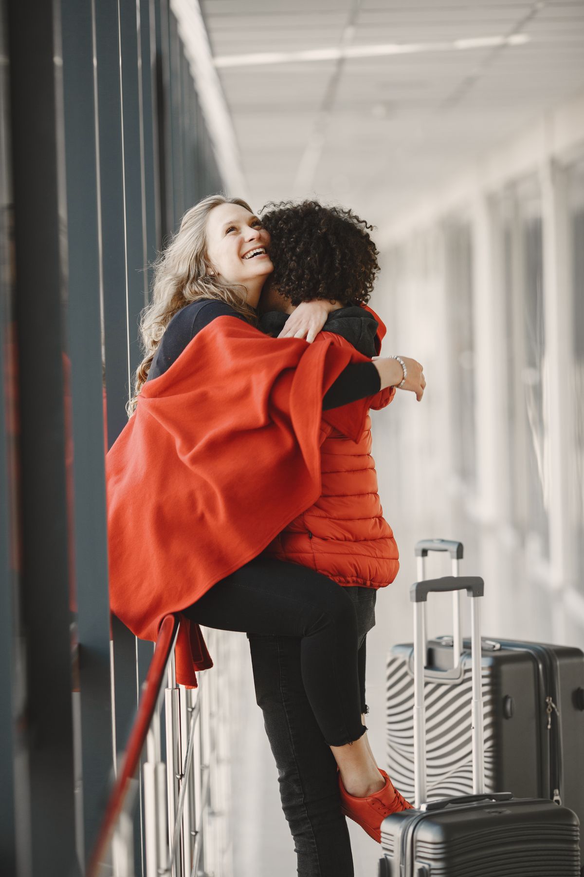 A warm airport reunion hug