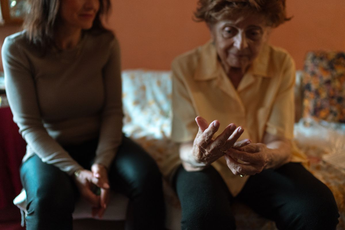 A warm visit with an elderly parent at home